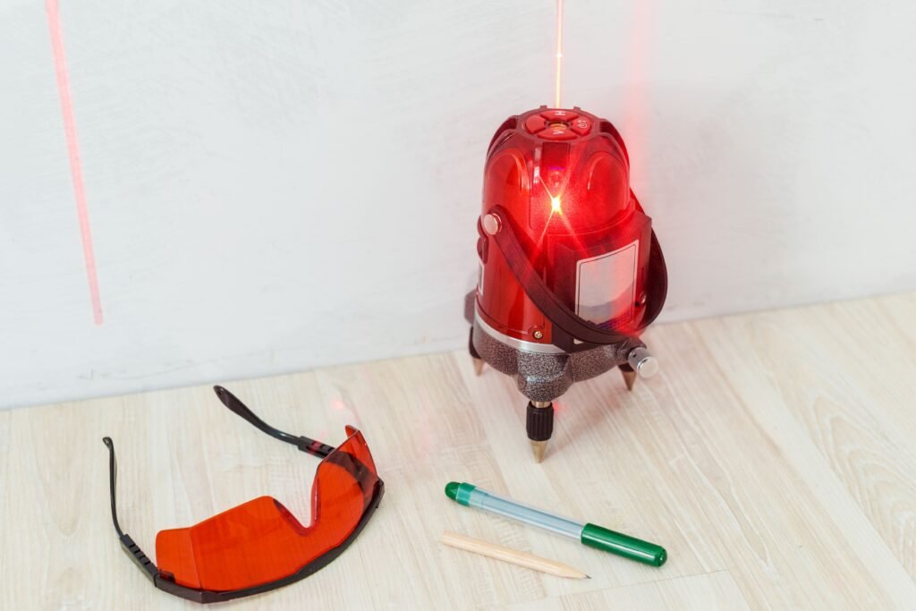 laser level measuring tool on a tripod